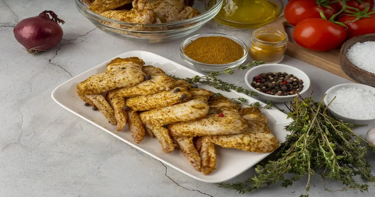 Turkey wings baked to golden perfection with crispy skin and fresh herbs